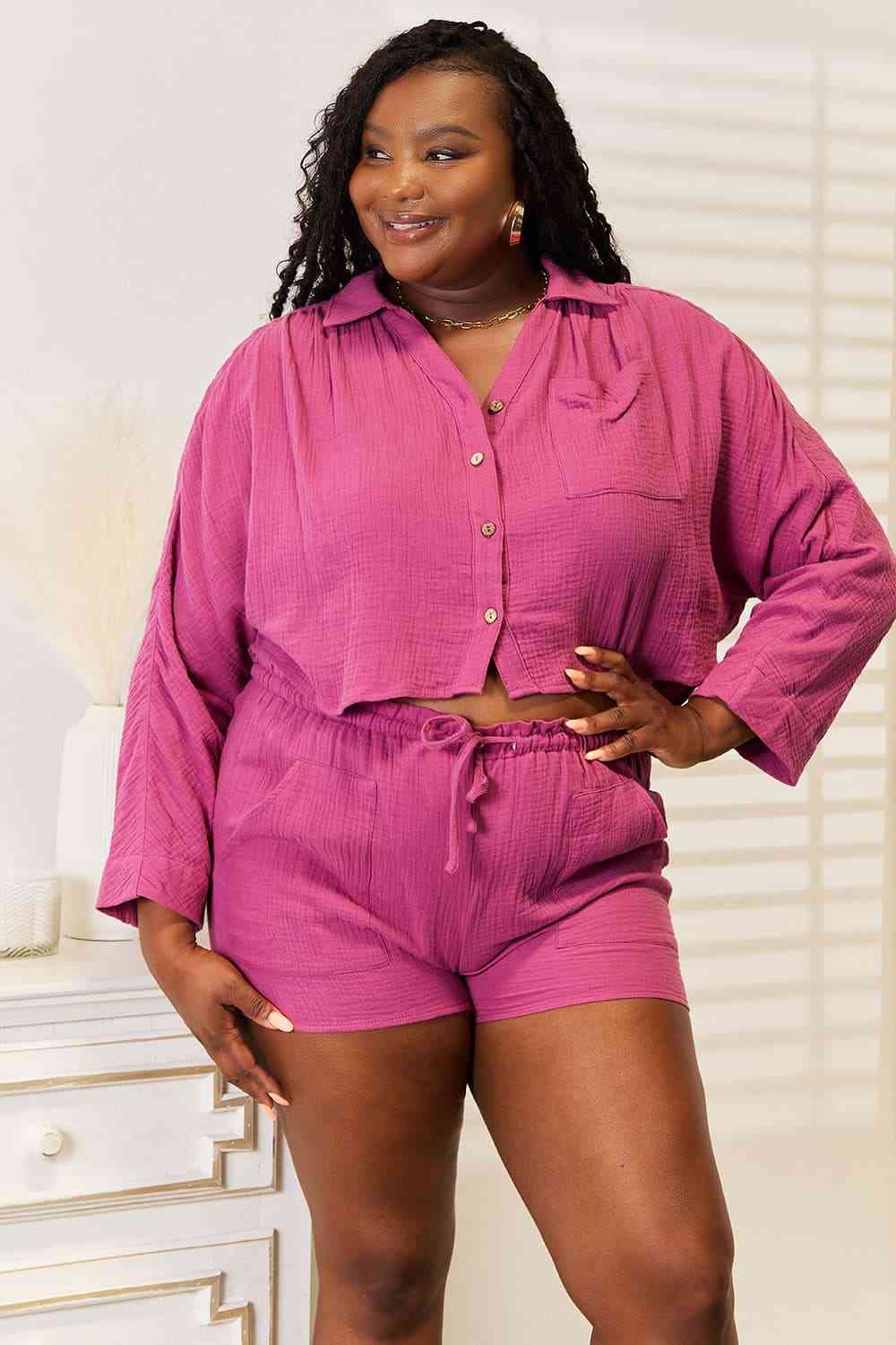 Woman wearing pink colored top and shorts