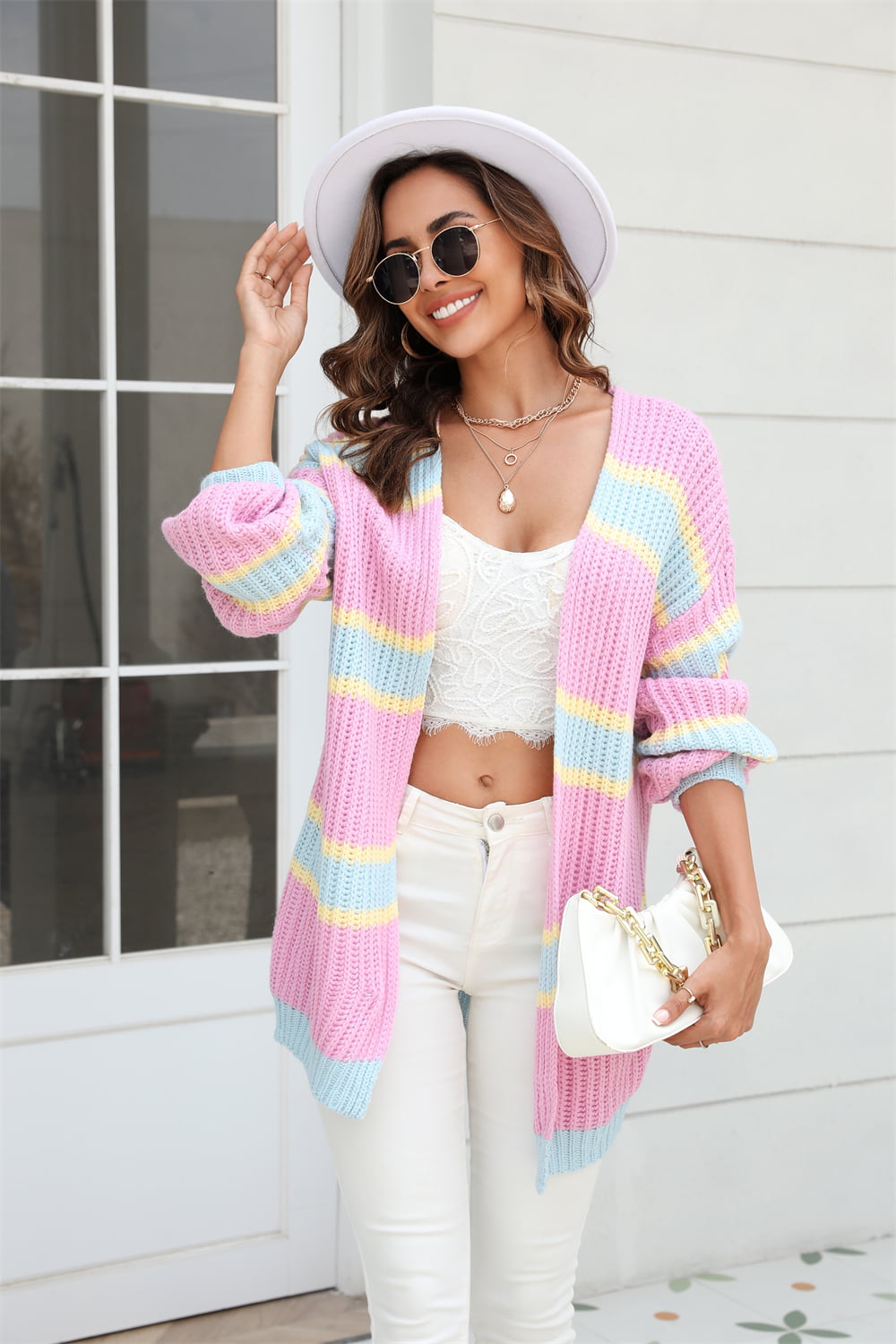 woman in pink striped cardigan