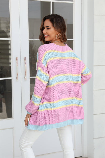 woman in pink striped cardigan