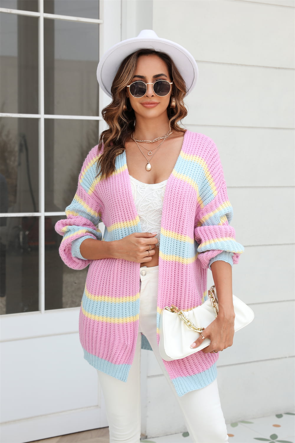 woman in pink striped cardigan