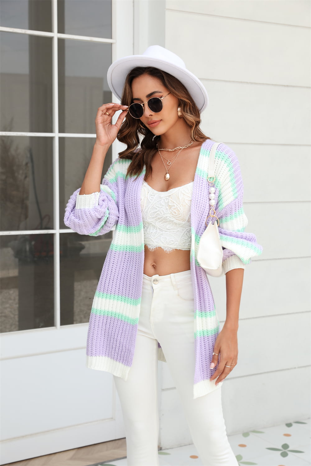 woman in purple striped cardigan