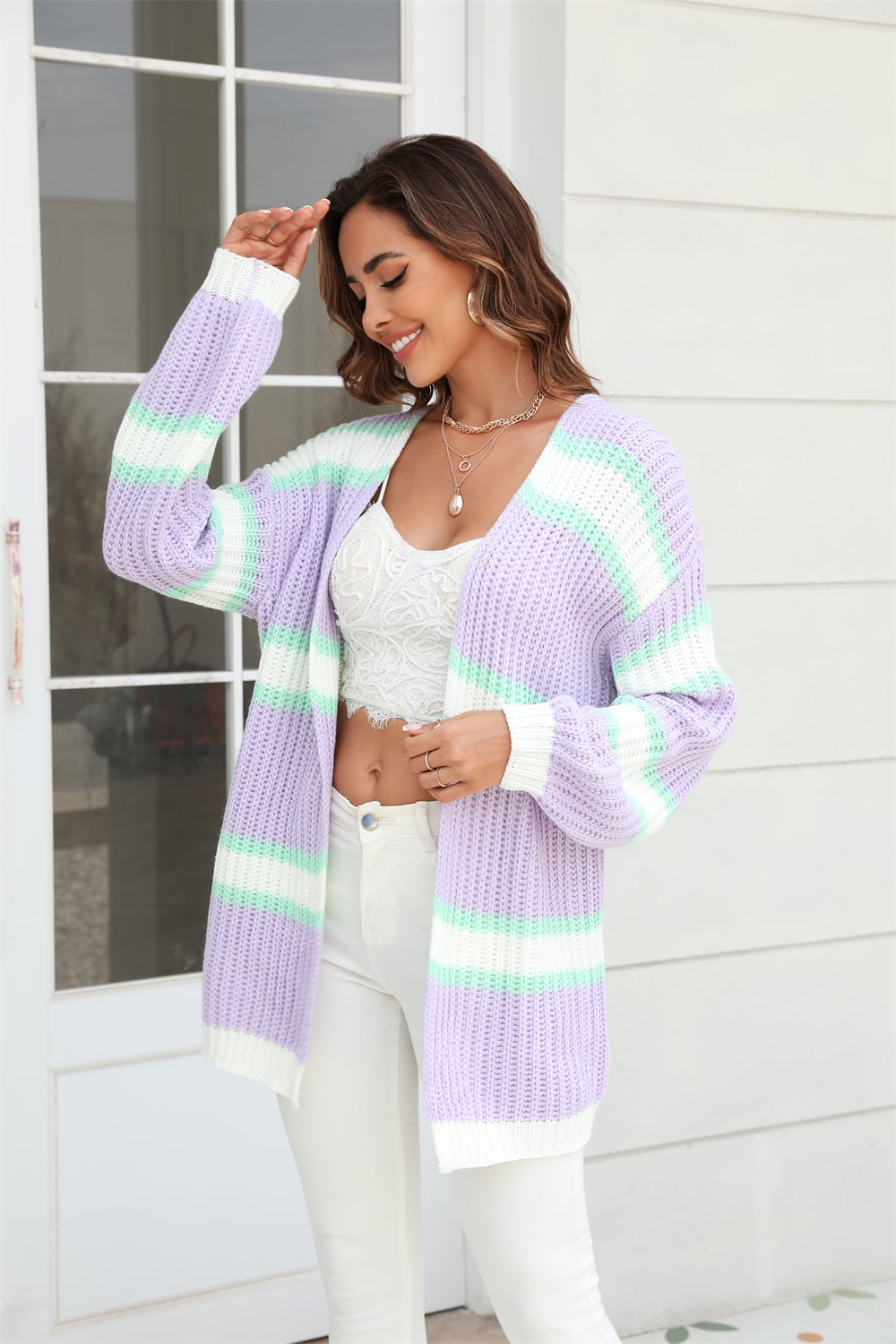 woman in purple striped cardigan