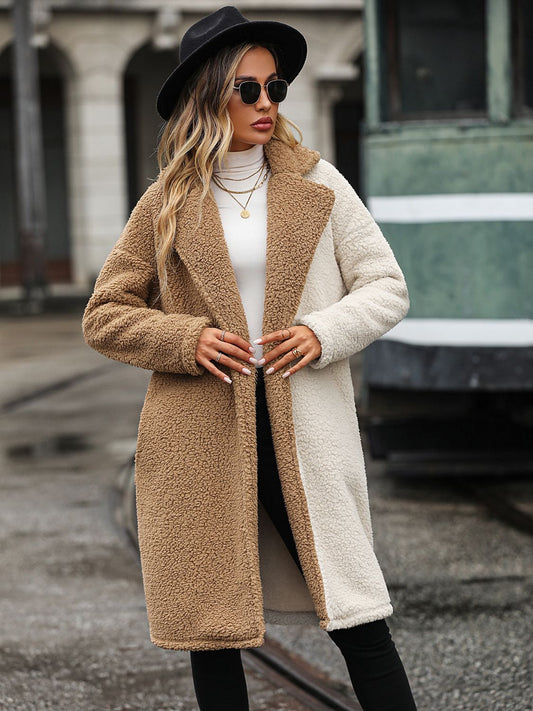 woman in two toned sherpa coat