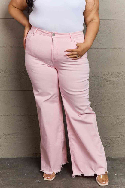 Woman wearing light pink jeans