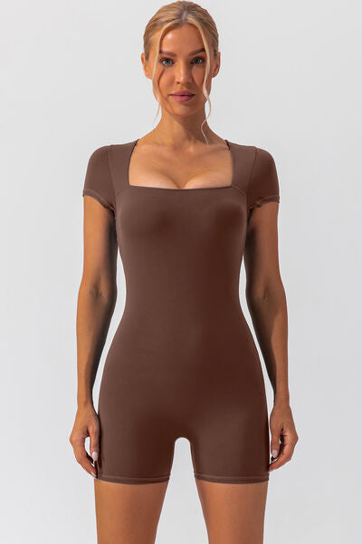 Woman wearing brown shapewear romper