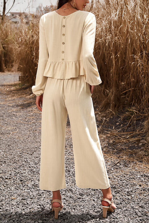 Woman wearing cream colored top and pants