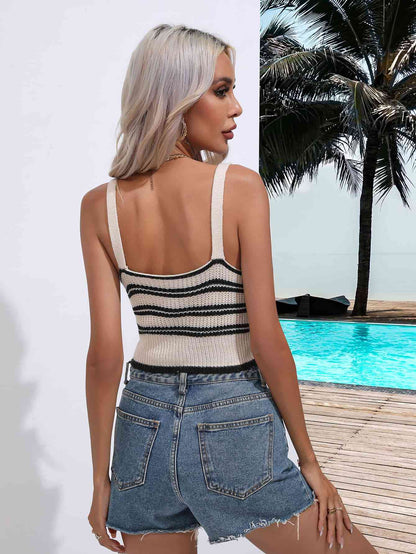 Woman wearing a striped knit tank top and denim shorts