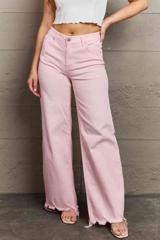 Woman wearing light pink jeans