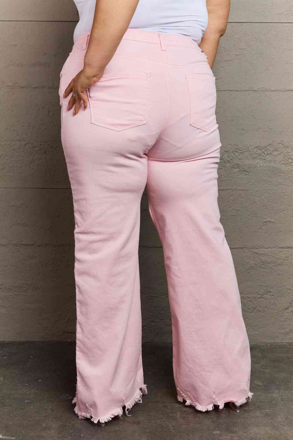 Woman wearing light pink jeans