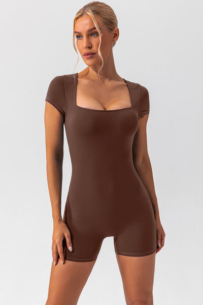 Woman wearing brown shapewear romper