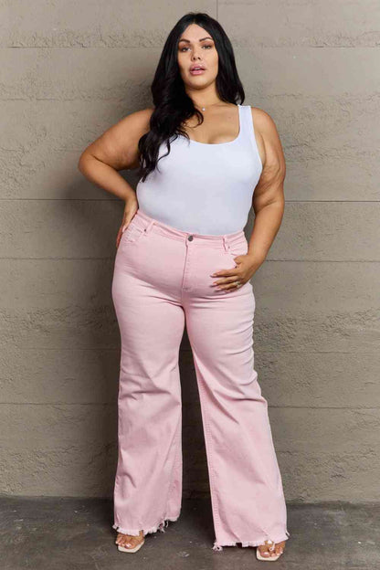 Woman wearing light pink jeans