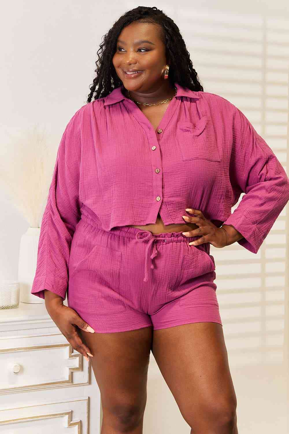 Woman wearing  pink colored top and shorts