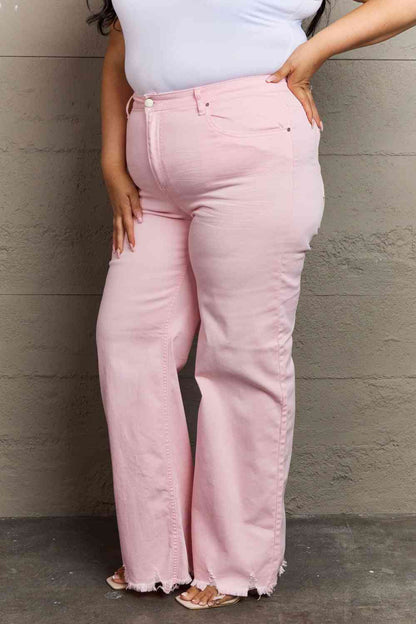 Woman wearing light pink jeans